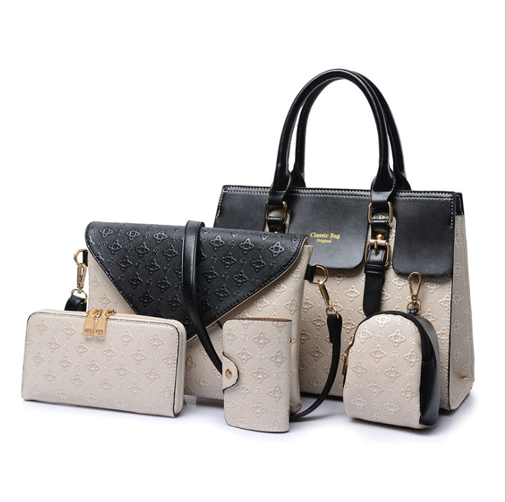 a set of luxury leather handbags black