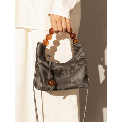 niche shoulder pearl chain crossbody handbag