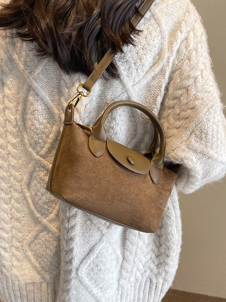 hand held dumplings matte stitching shoulder crossbody