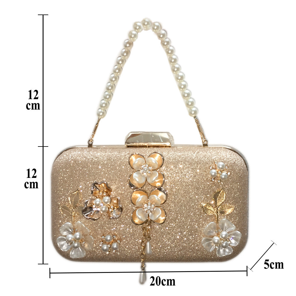 diamond studded pearl petal chain tassel dinner bag