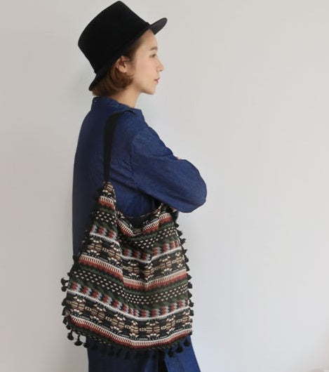 geometric tribal tasselled tote bags