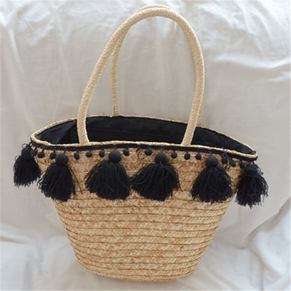 female hand woven tassel shoulder bag