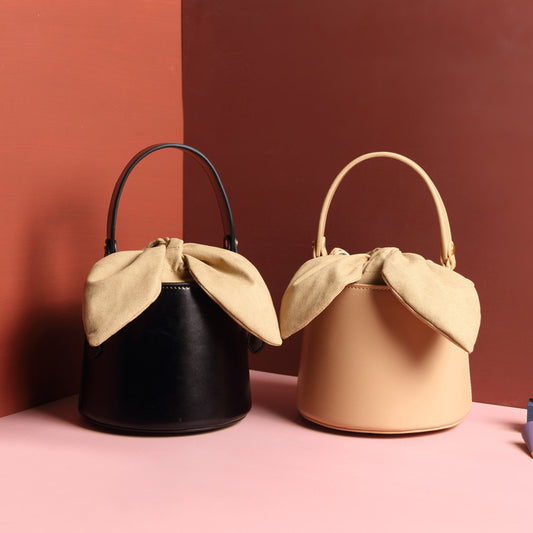 leather bow bucket bag