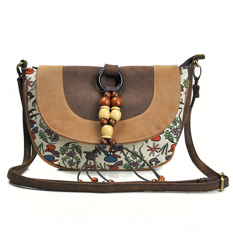 female ethnic style leather messenger dumpling bag