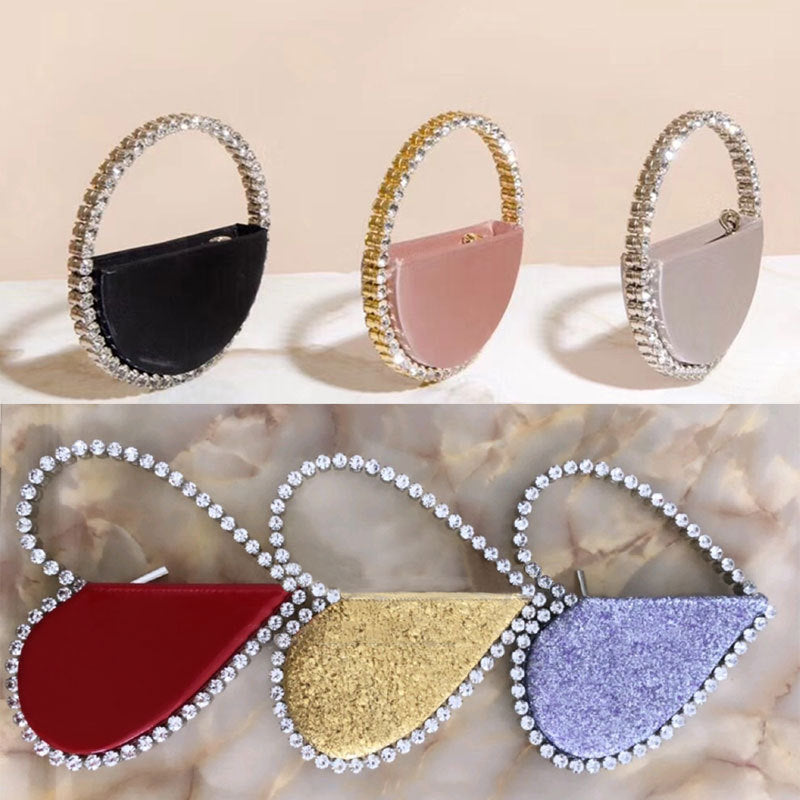 diamond studded dinner bag with diamond heart shaped clutch