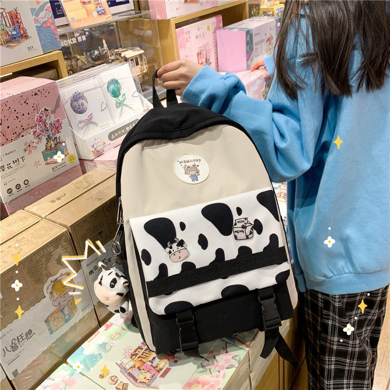 small fresh girl fashion cow pattern contrast color junior high school student schoolbag