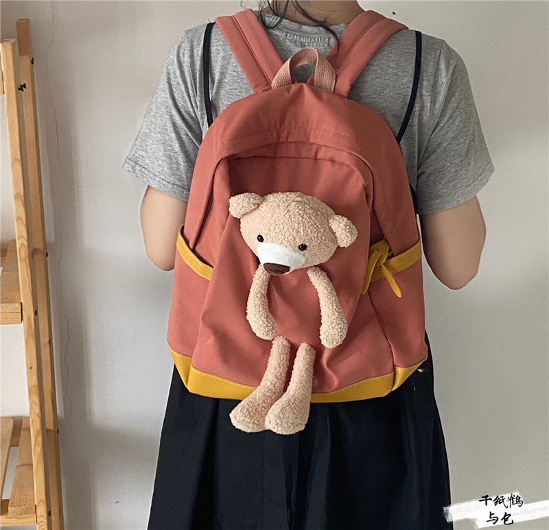 japanese students cartoon bear schoolbag in harajuku