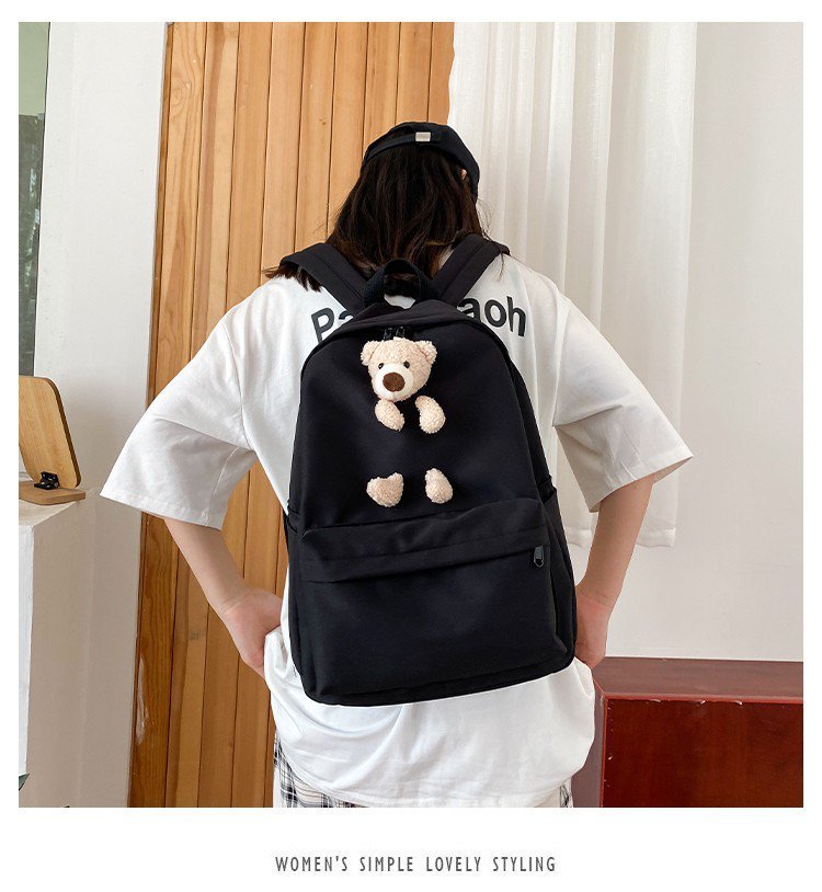 japanese students cartoon bear schoolbag in harajuku