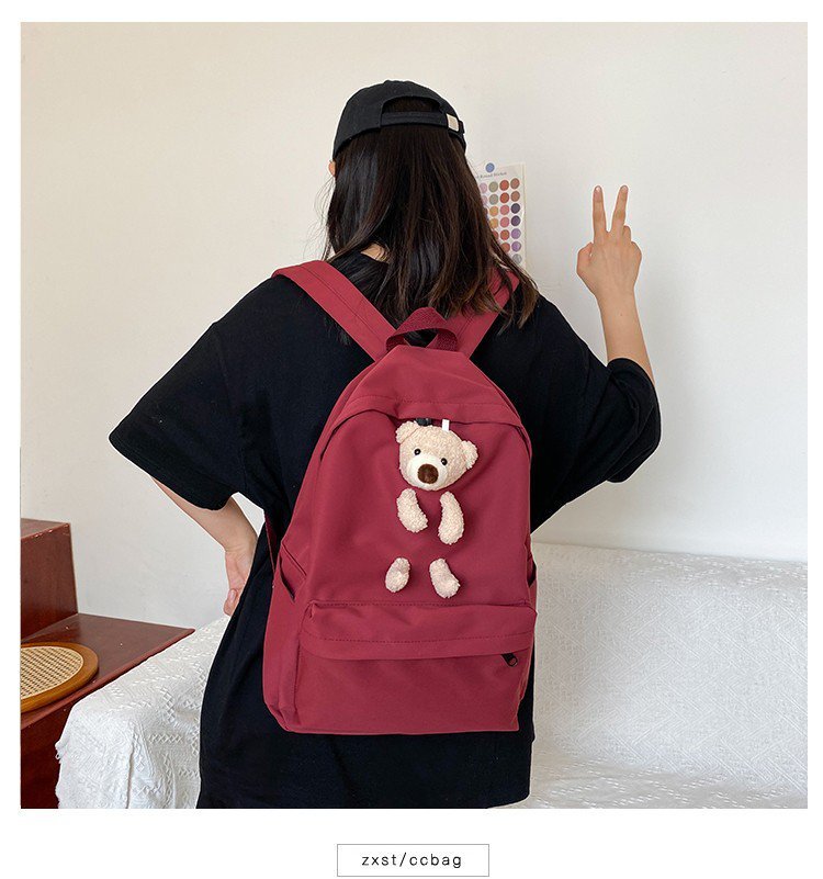 japanese students cartoon bear schoolbag in harajuku