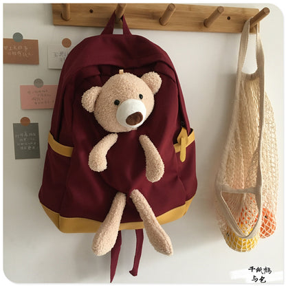 japanese students cartoon bear schoolbag in harajuku