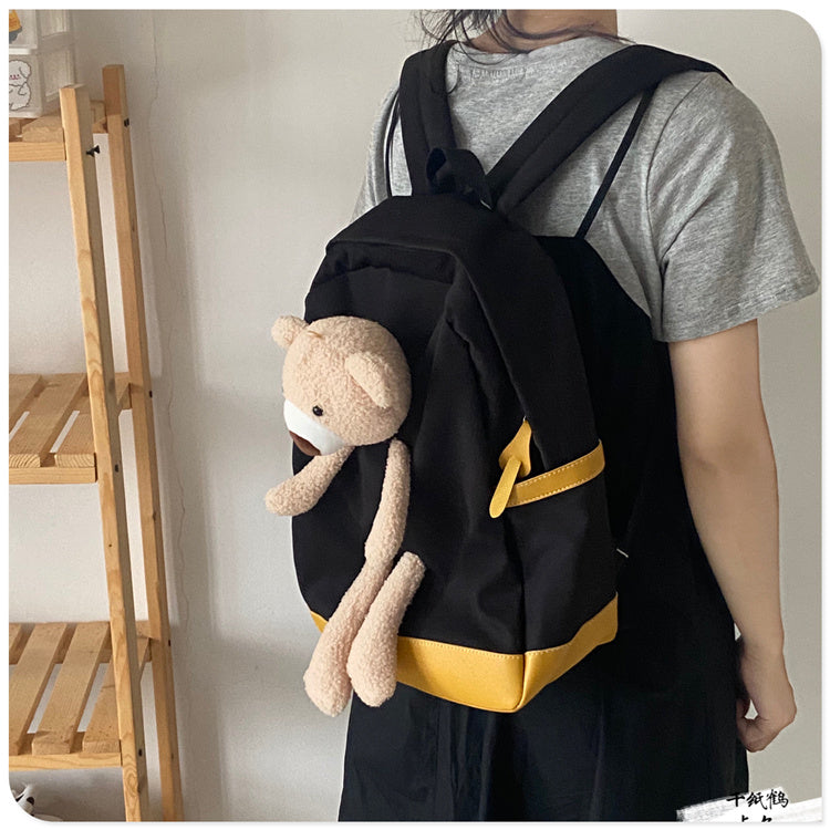 japanese students cartoon bear schoolbag in harajuku