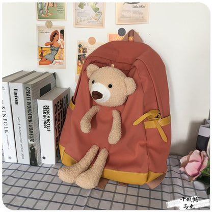 japanese students cartoon bear schoolbag in harajuku