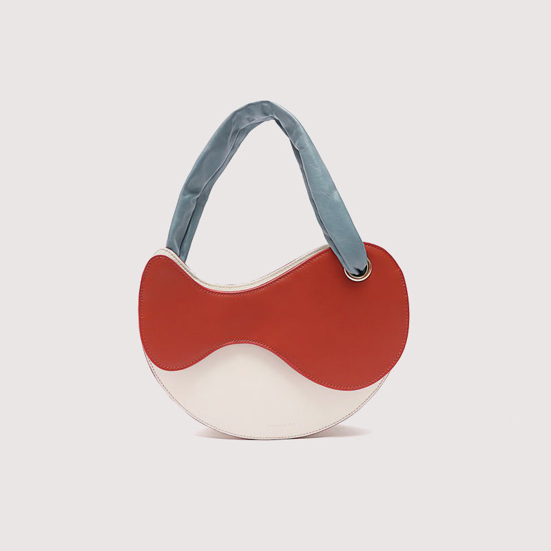 fashionable personality color blocking crescent semicircular single shoulder bag