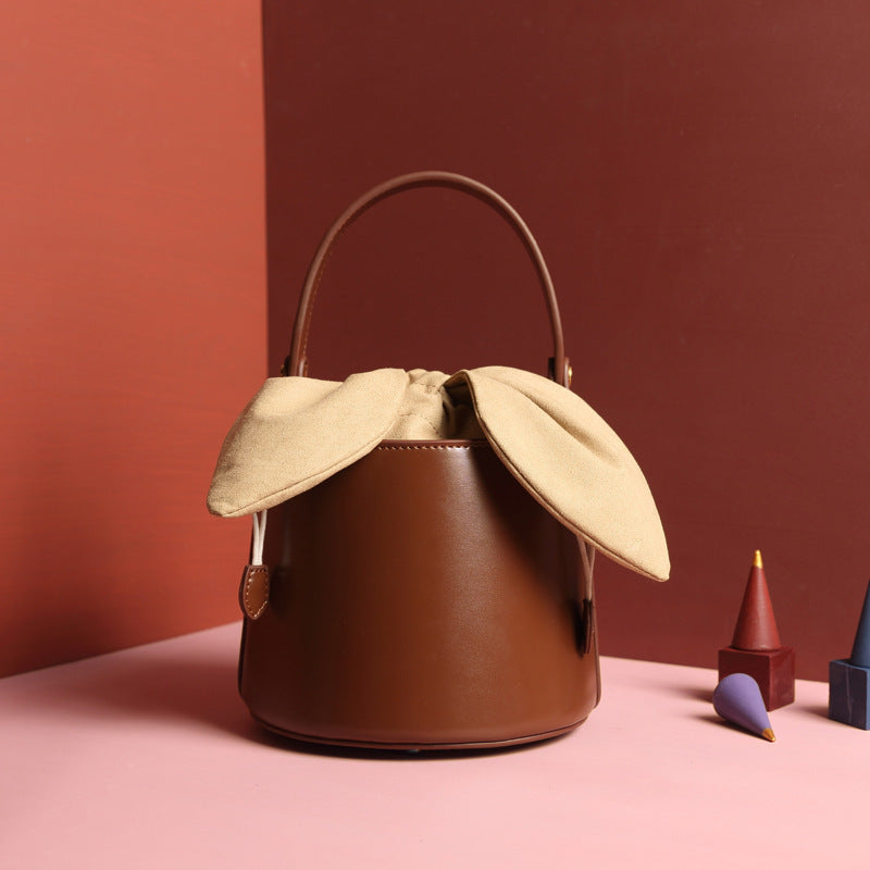 leather bow bucket bag