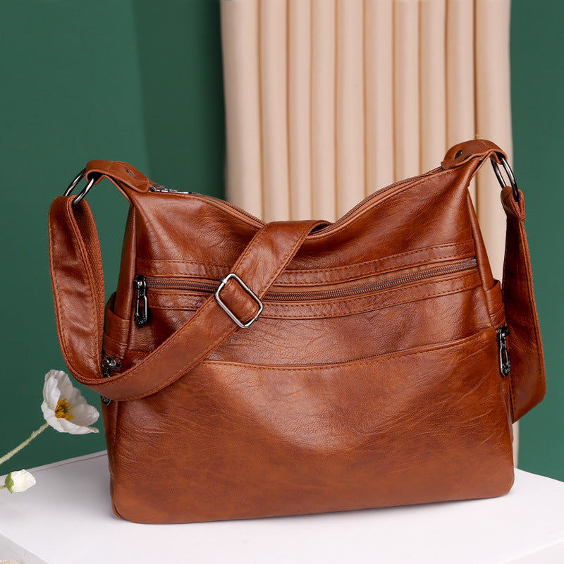 fashionable large capacity soft leather one shoulder messenger