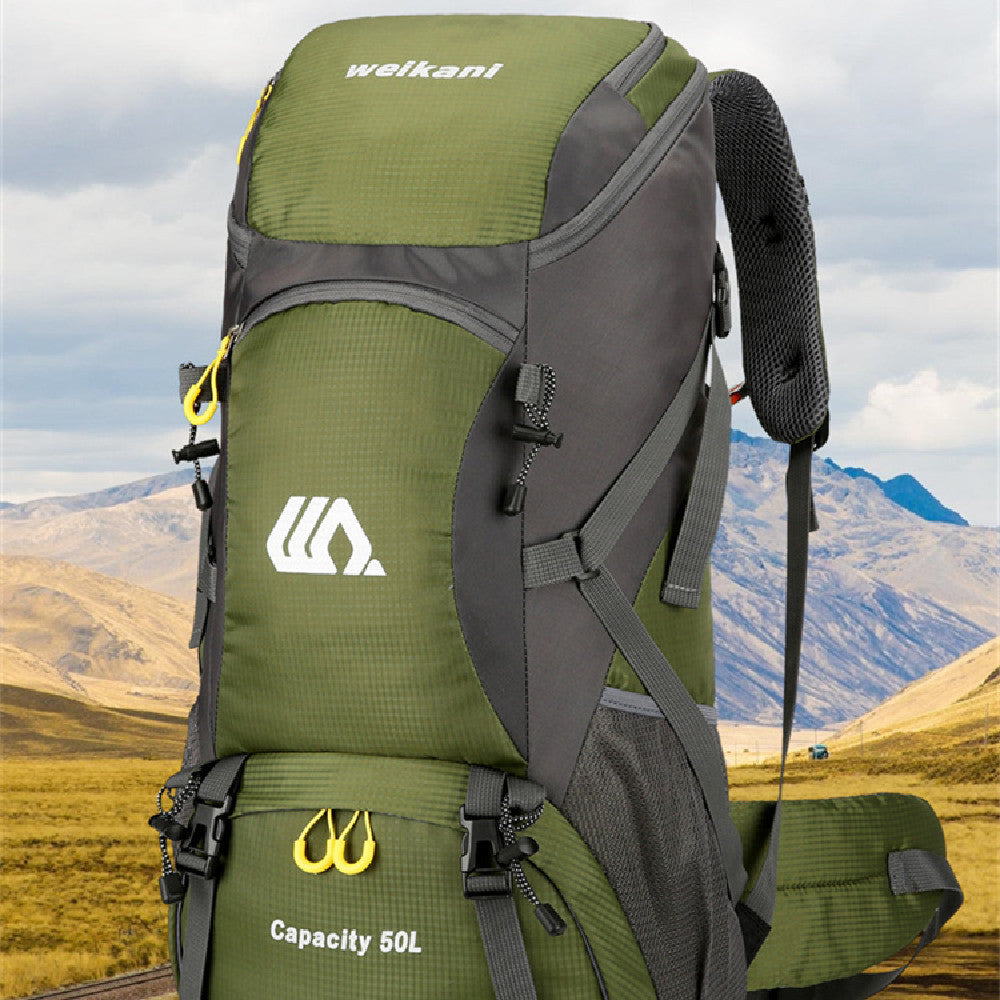 men and women on foot camping bag