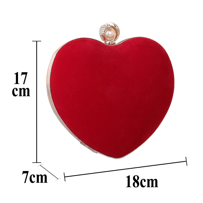 heart shaped dinner bag with diamond pearls