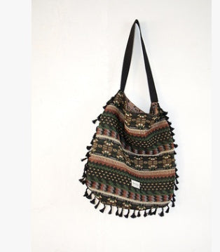 geometric tribal tasselled tote bags