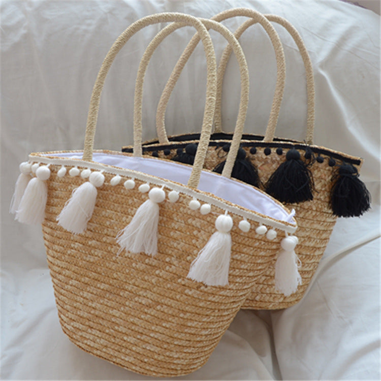 female hand woven tassel shoulder bag