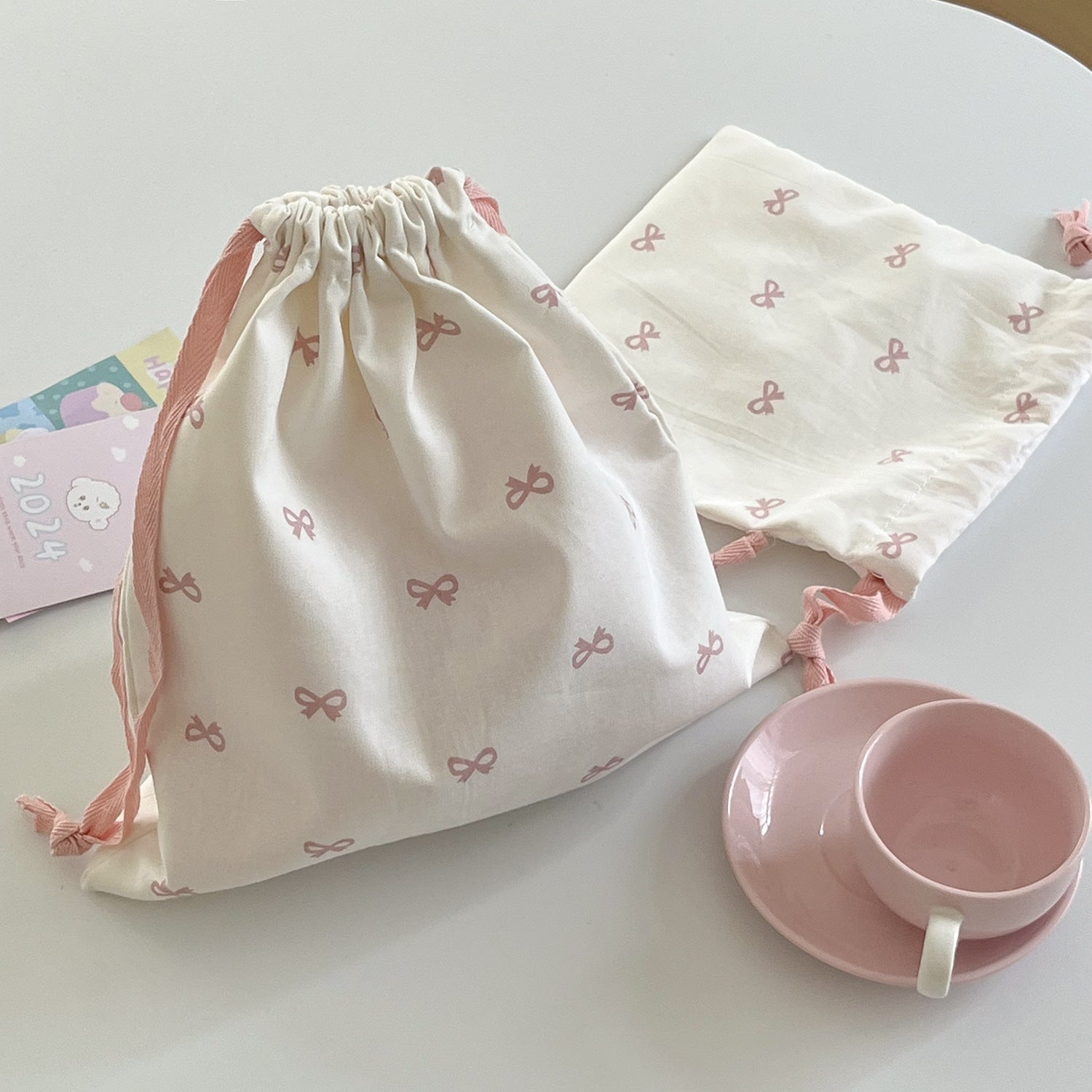 sweet bow print drawstring storage bag