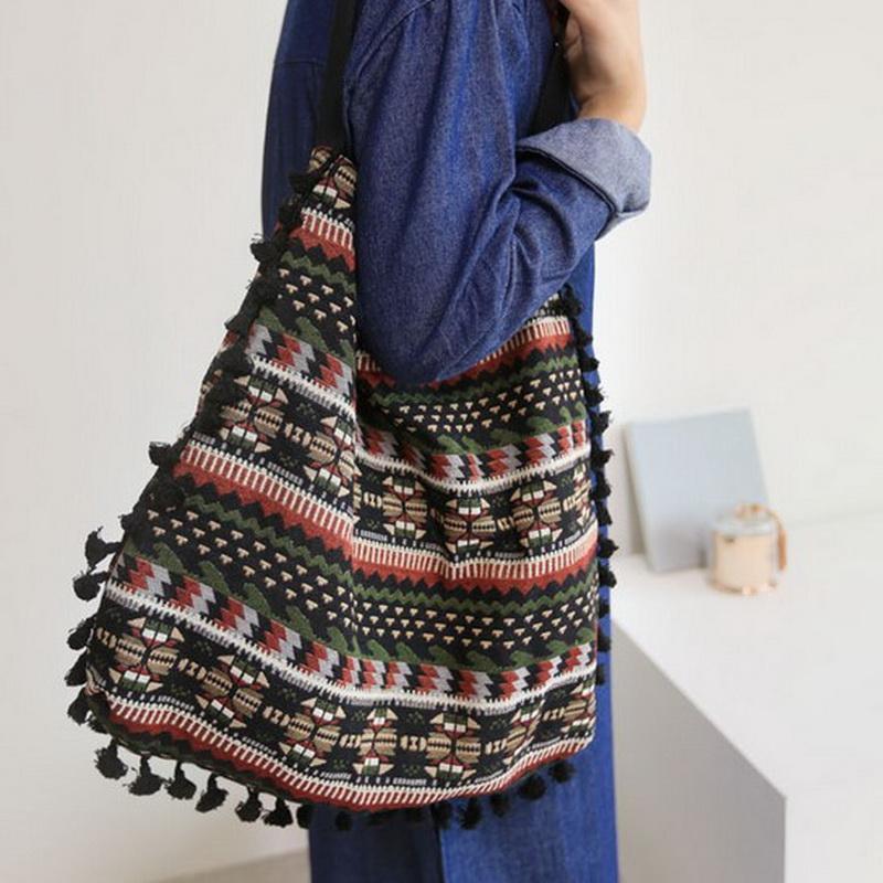 geometric tribal tasselled tote bags