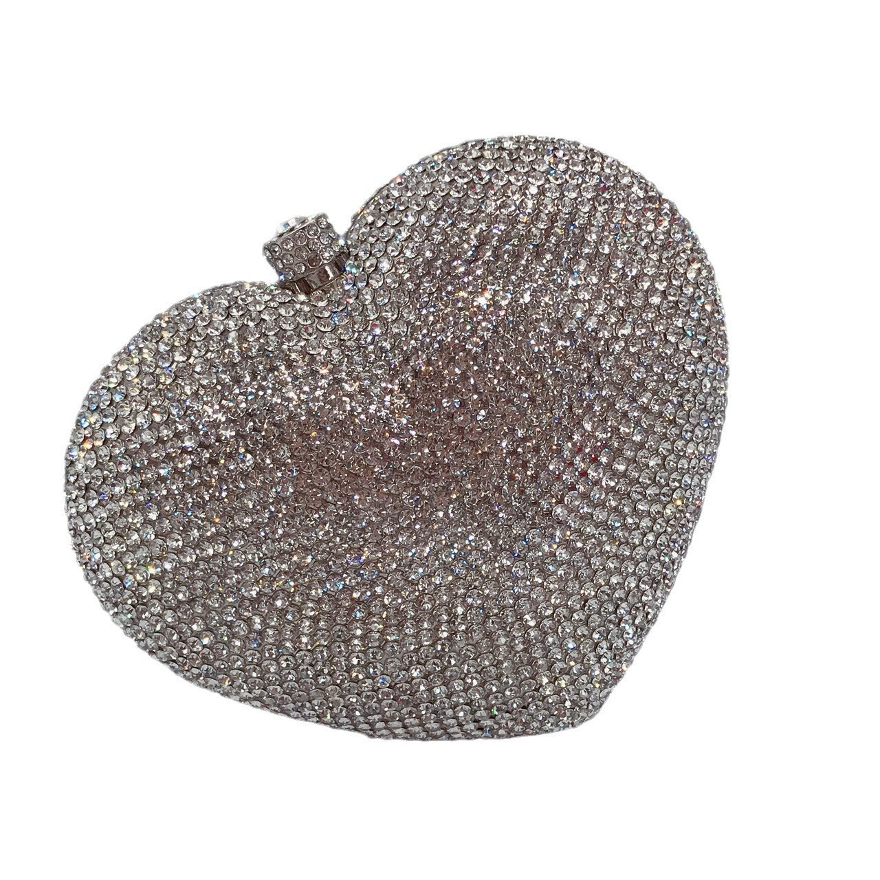 hand holding heart shaped diamond dinner bag