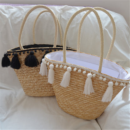 female hand woven tassel shoulder bag