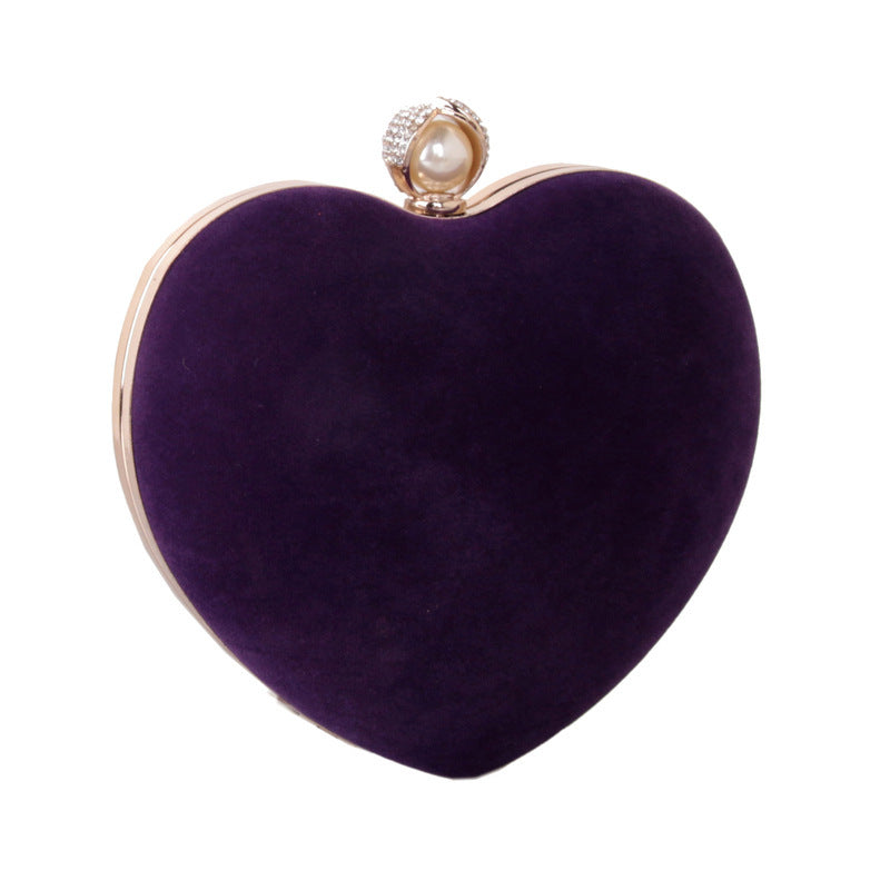 heart shaped dinner bag with diamond pearls