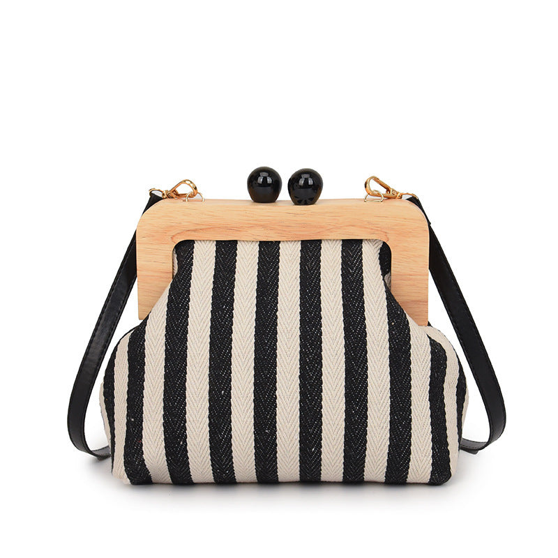 new striped canvas wooden clip mouth clutch