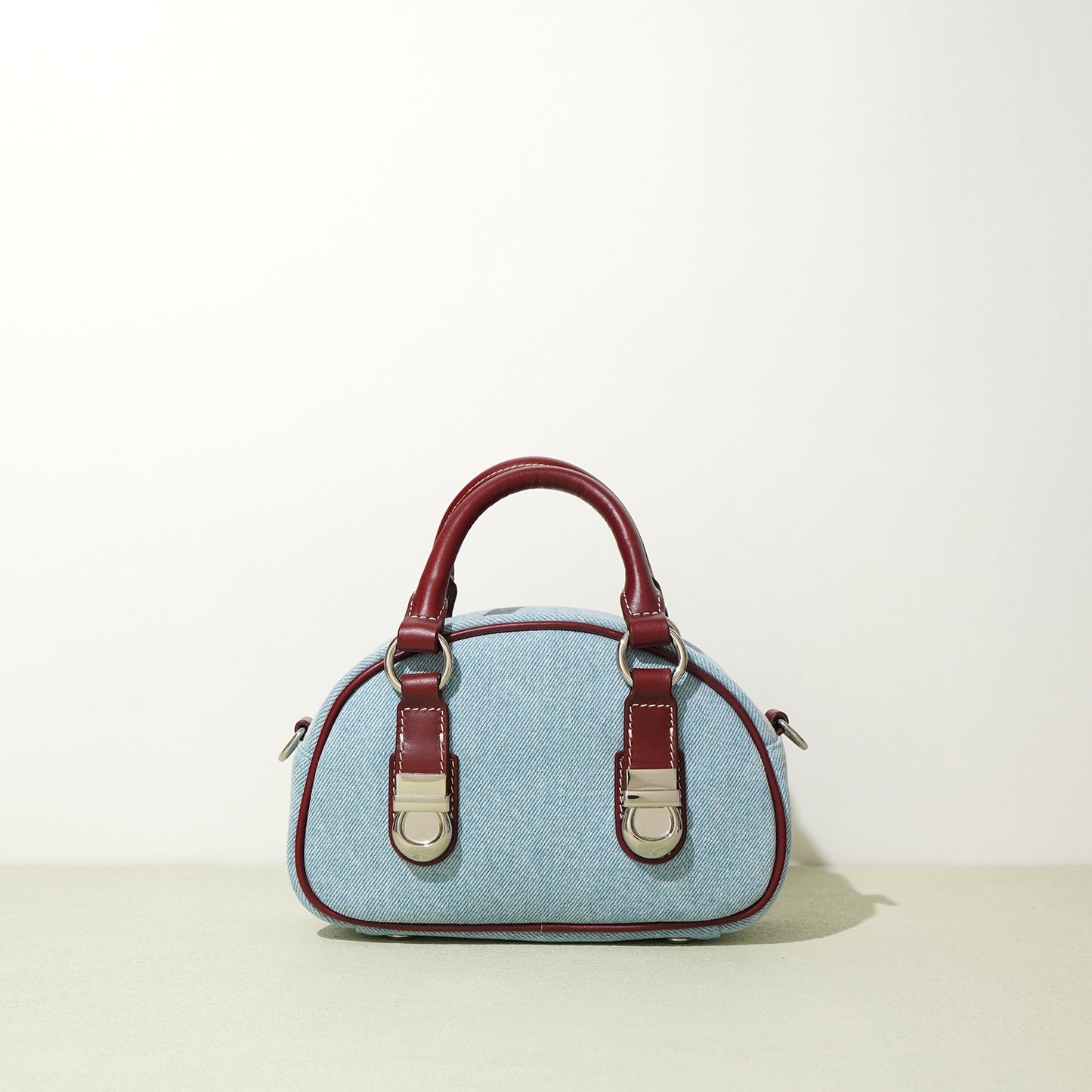 first layer cowhide with denim bun shaped bag
