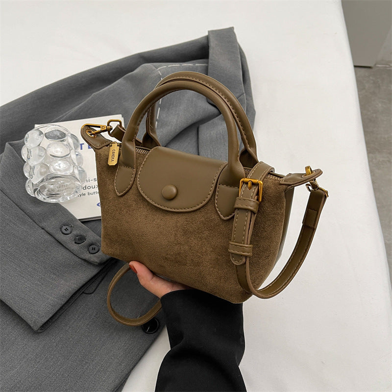 hand held dumplings matte stitching shoulder crossbody