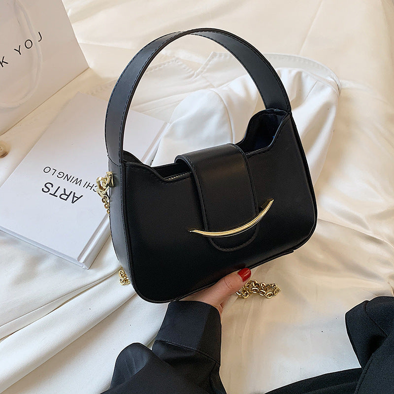 smiley western style one shoulder armpit handbag