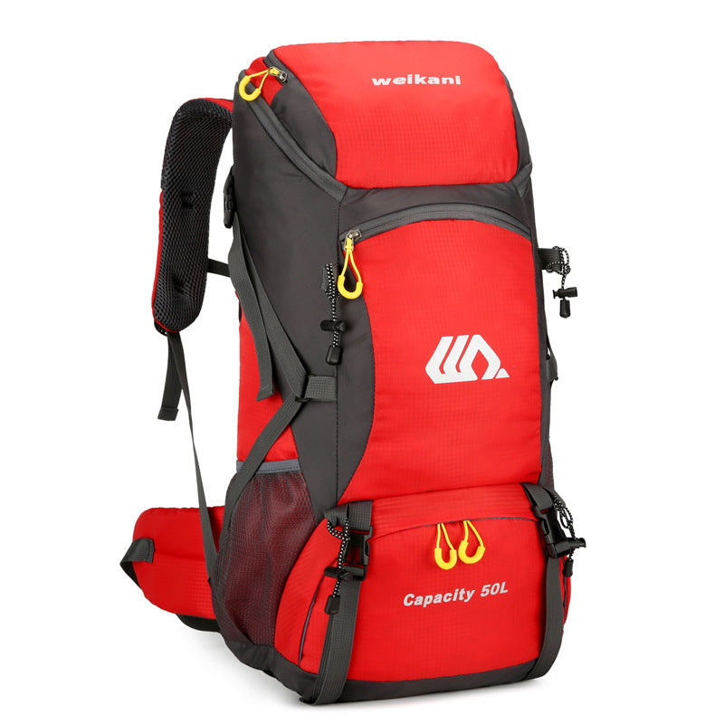 men and women on foot camping bag