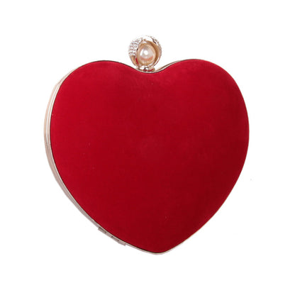 heart shaped dinner bag with diamond pearls