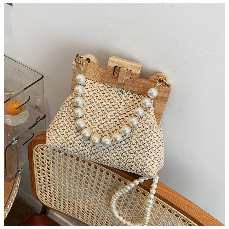 womens straw beach pearl chain woven shoulder bag