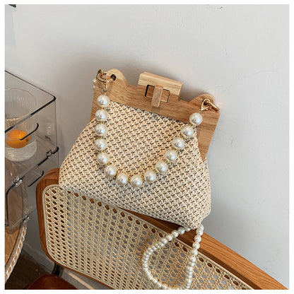 womens straw beach pearl chain woven shoulder bag