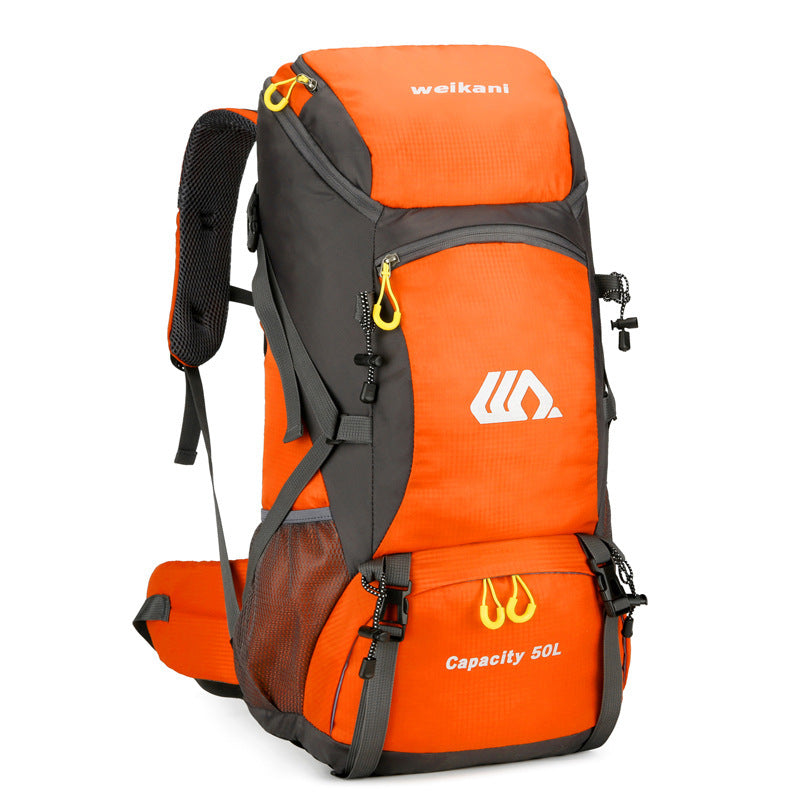 men and women on foot camping bag