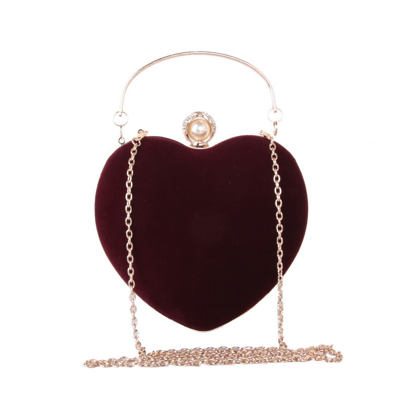 heart shaped dinner bag with diamond pearls