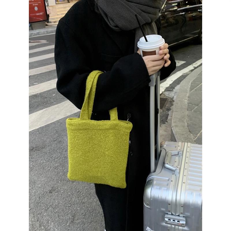 mustard green wool material woven handbag