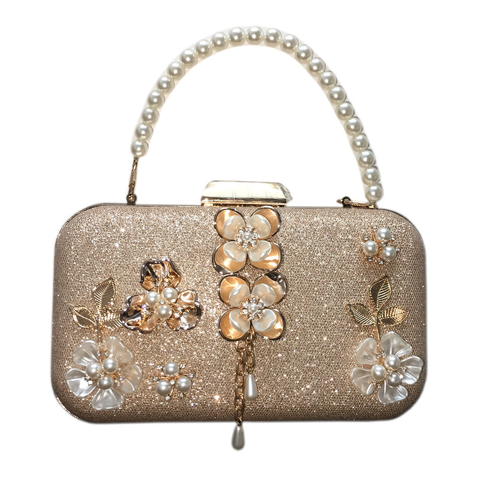 diamond studded pearl petal chain tassel dinner bag