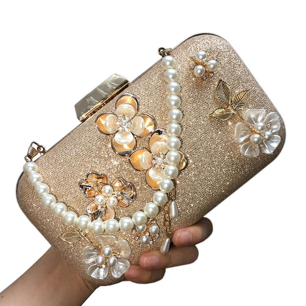 diamond studded pearl petal chain tassel dinner bag