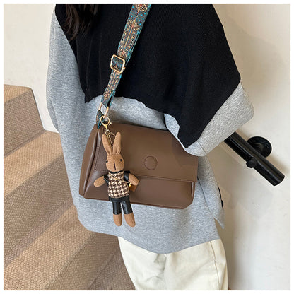 Versatile Small Square Bag With A Wide Shoulder Strap For Crossbody Wear