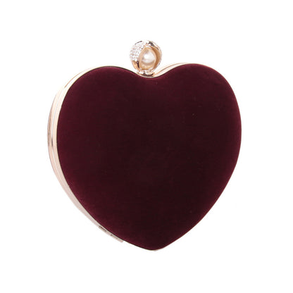 heart shaped dinner bag with diamond pearls