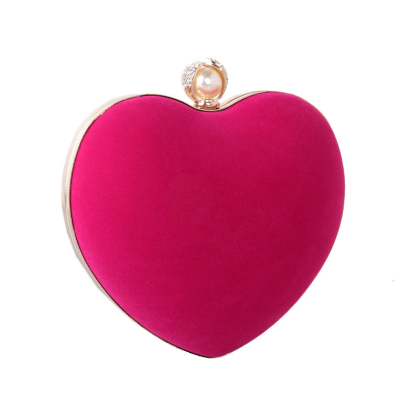 heart shaped dinner bag with diamond pearls