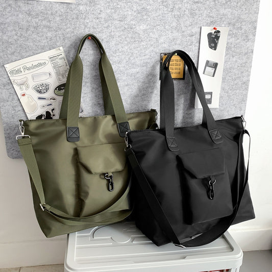 large capacity crossbody hand carrying dual use short trip bag