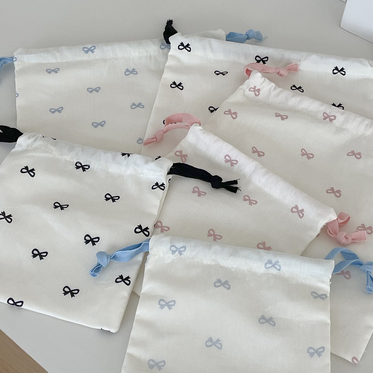 sweet bow print drawstring storage bag