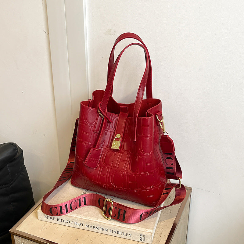 Letter Embossed Solid Color Fashion Retro Classic One-shoulder Portable Commuter Bucket Bag