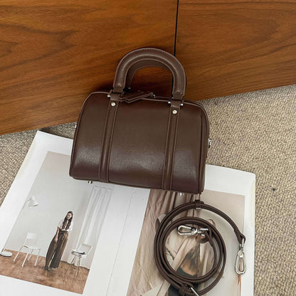 versatile cylindrical genuine leather portable crossbody bag