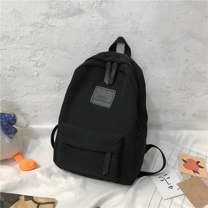 solid backpack for men and women korean version junior high school students schoolbag outdoor large capacity travel bags