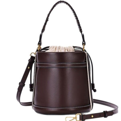 Brown Cylindrical Tote Bag With Dual Handles, Designed For Handheld Or Crossbody Wear